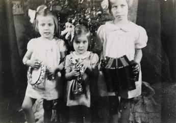 (CHRISTMAS CELEBRATION) Family archive containing more than 160 photographs that largely depict 3 sisters